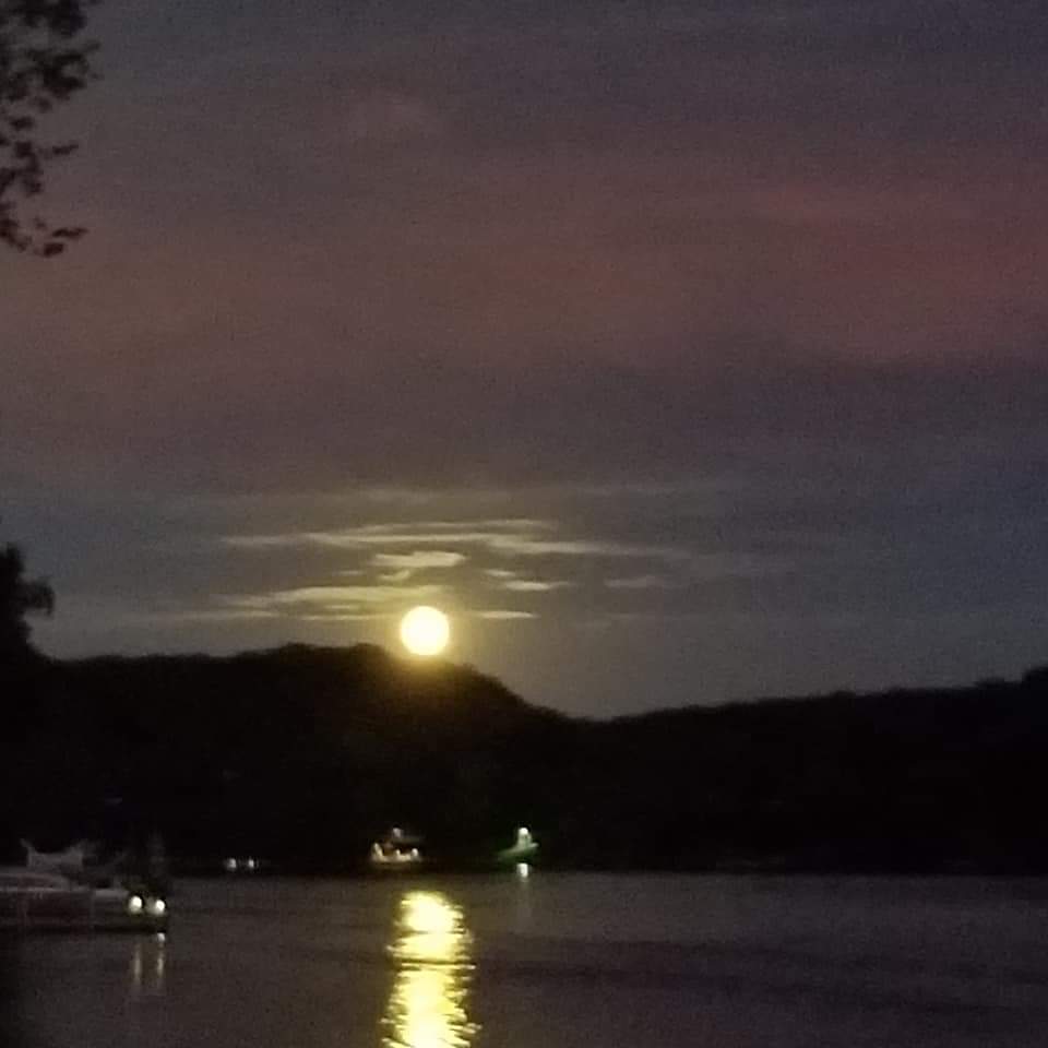 The moon reflecting on Lake Sherwood